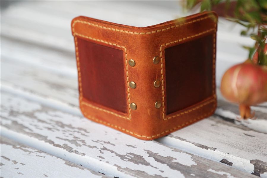 Hand-stitched leather wallet with cash pocket and card slots