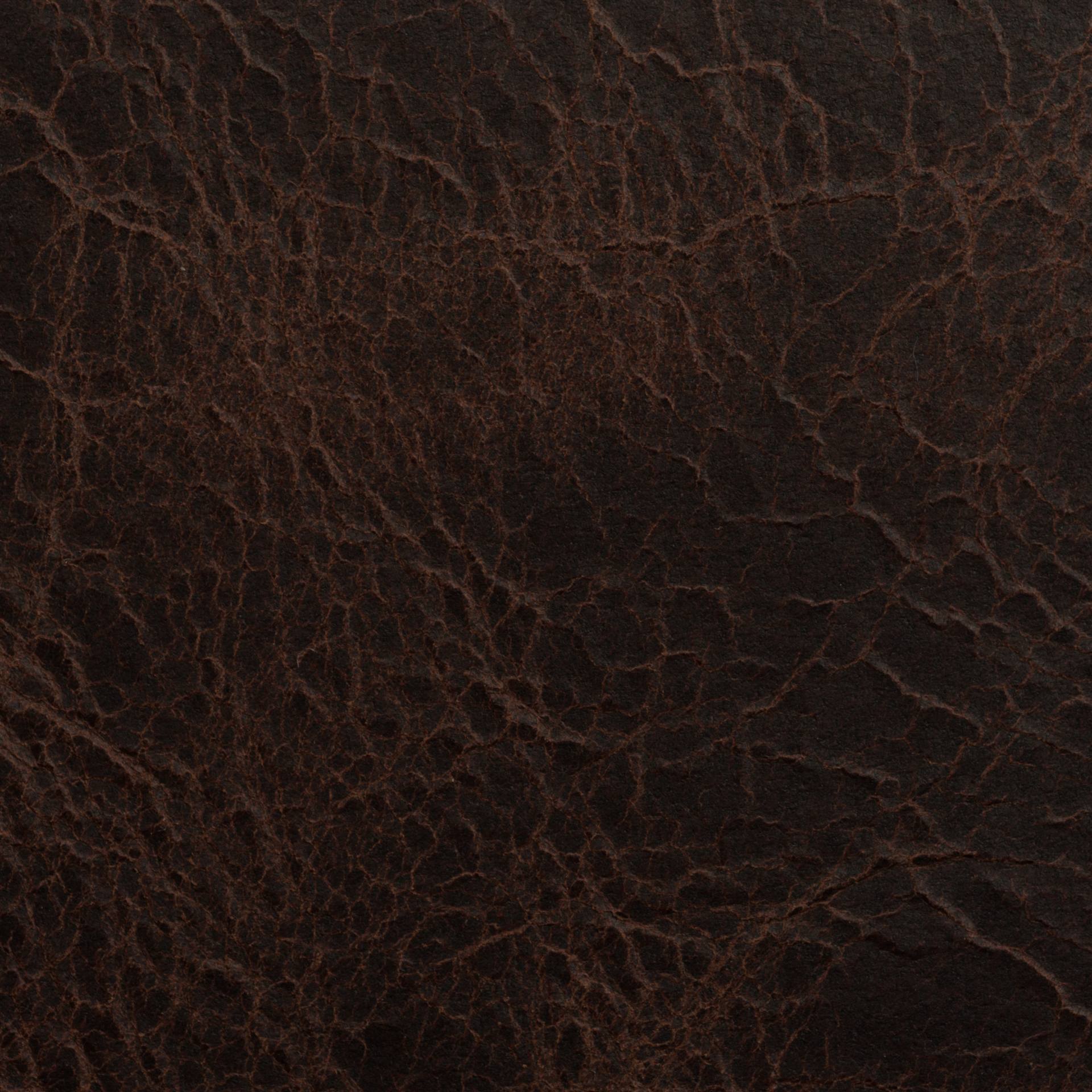 Deeply grained antique leather that has aged for decades